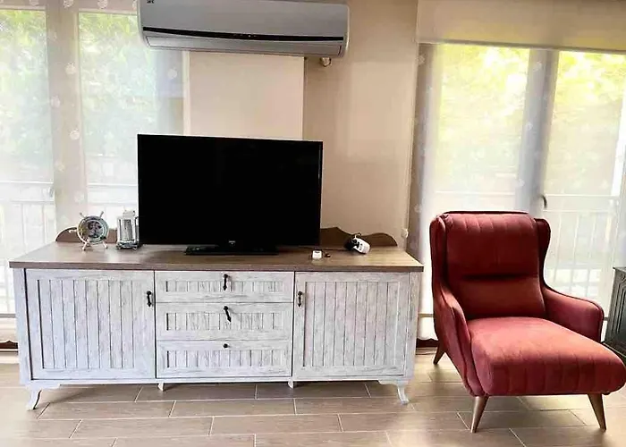 Апартаменты Ayvilla 1 Garden Floor With Garden Use, Sea View